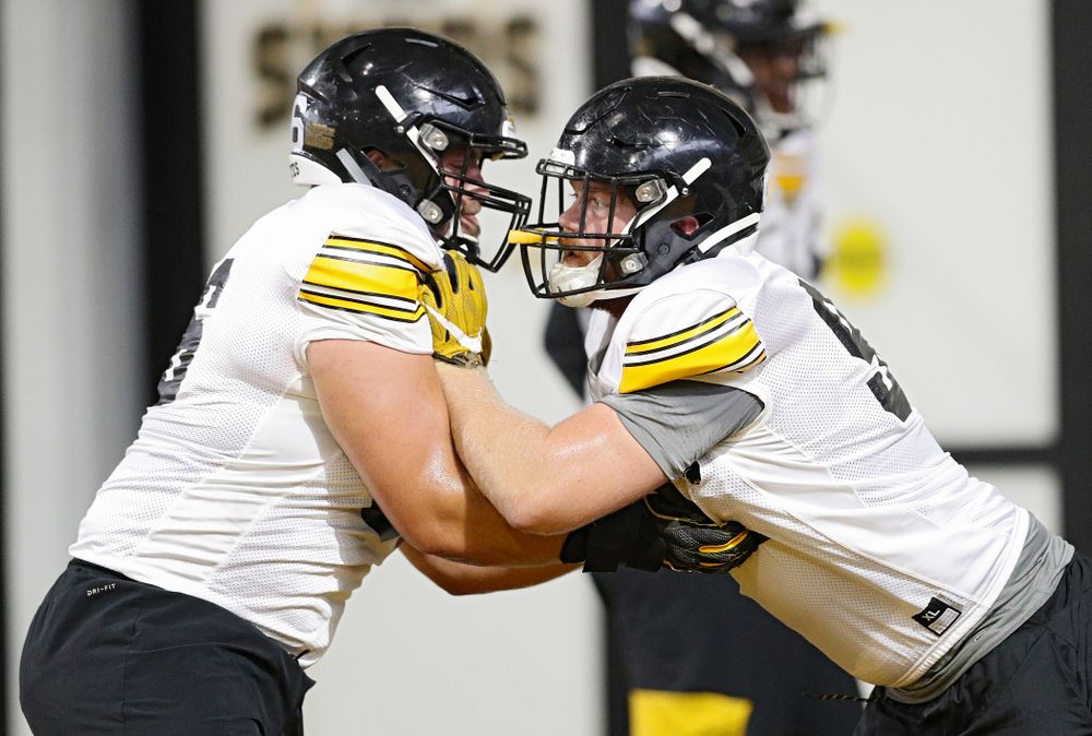 Iowa Hawkeyes defensive lineman Dalles Jacobus (66) and defensive lineman John Waggoner (92) work on a drill during Fall Camp Practice No. 9 at the Hansen Football Performance Center in Iowa City on Monday, Aug 12, 2019. (Stephen Mally/hawkeyesports.com)