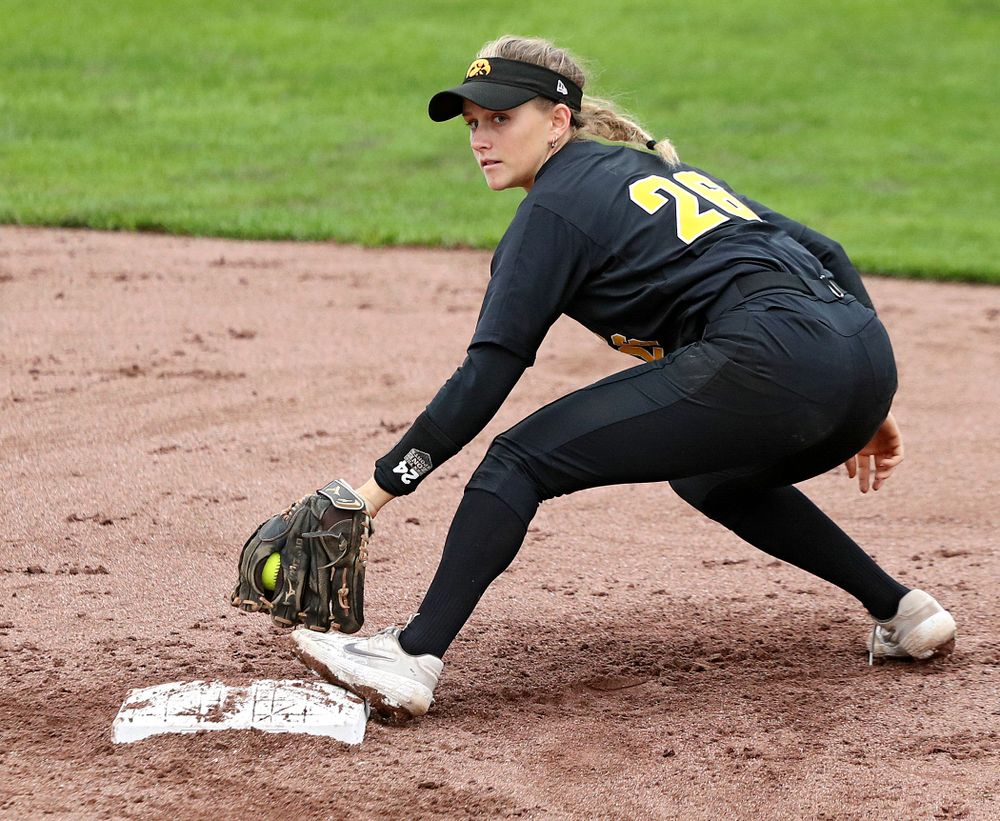 Iowa infielder Mia Ruther (26) eyes the runner after snagging a throw during the fifth inning of their game against Iowa Softball vs Indian Hills Community College at Pearl Field in Iowa City on Sunday, Oct 6, 2019. (Stephen Mally/hawkeyesports.com)