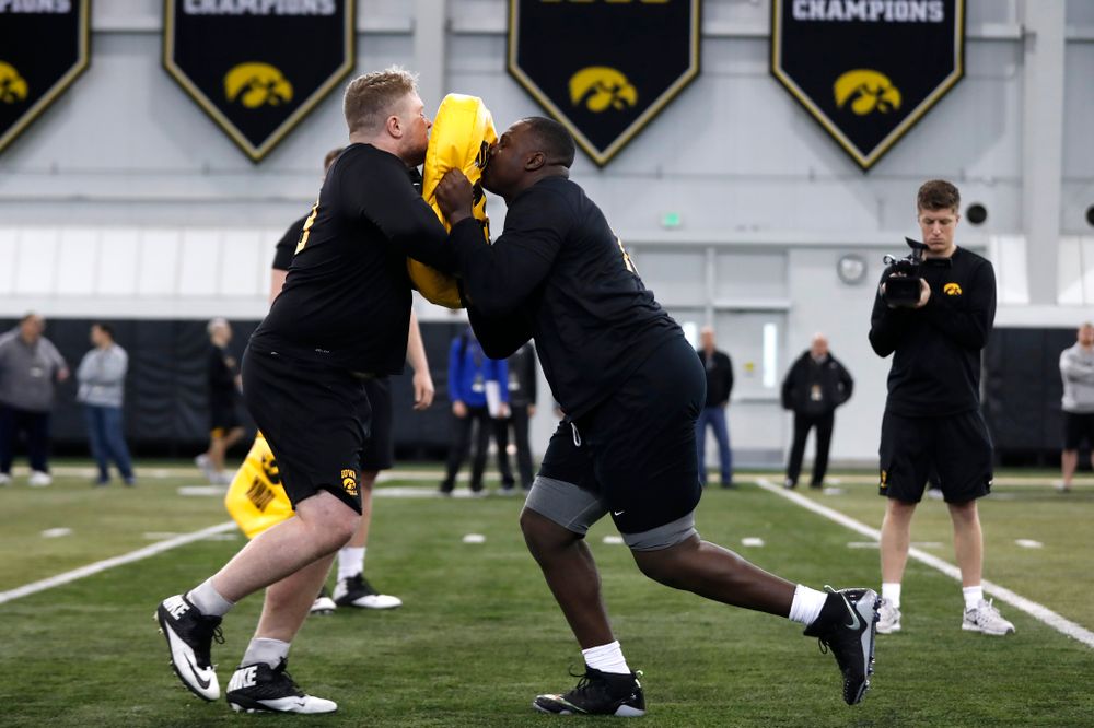 Iowa Hawkeyes offensive lineman James Daniels (78) and offensive lineman Sean Welsh (79) during the team's annual pro day Monday, March 26, 2018 at the Hansen Football Performance Center. (Brian Ray/hawkeyesports.com)
