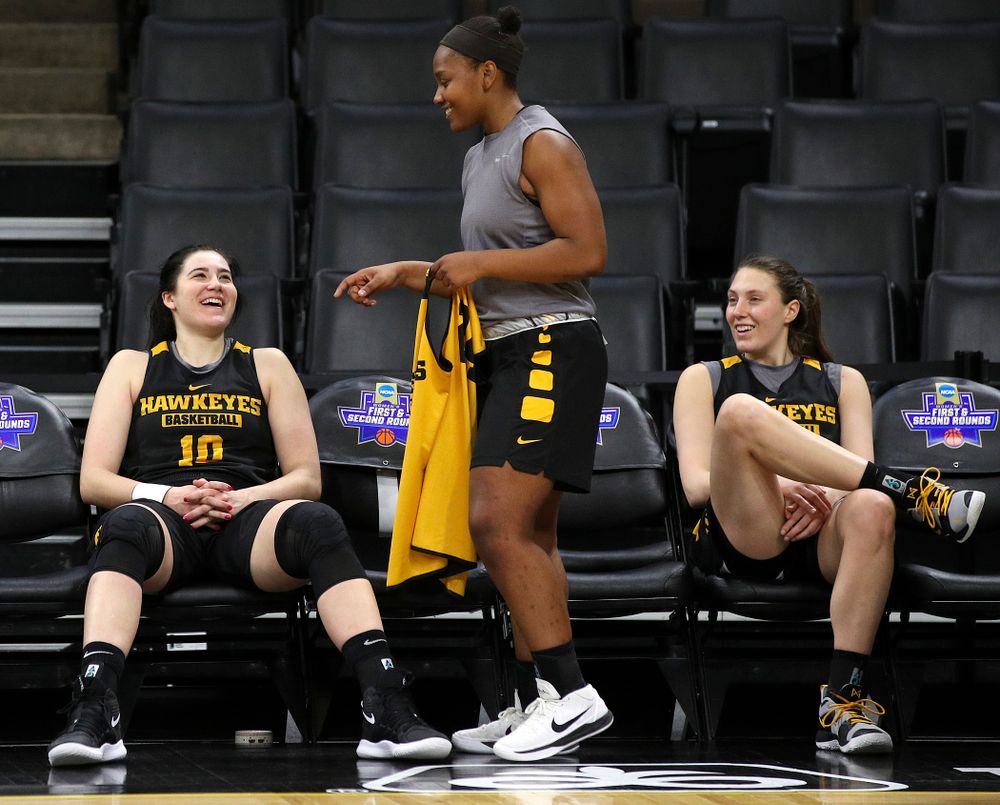 Iowa Hawkeyes forward Megan Gustafson (10), guard Zion Sanders (24), and forward Amanda Ollinger (43) share a laugh at a practice during the 2019 NCAA Women's Basketball Tournament at Carver Hawkeye Arena in Iowa City on Saturday, Mar. 23, 2019. (Stephen Mally for hawkeyesports.com)