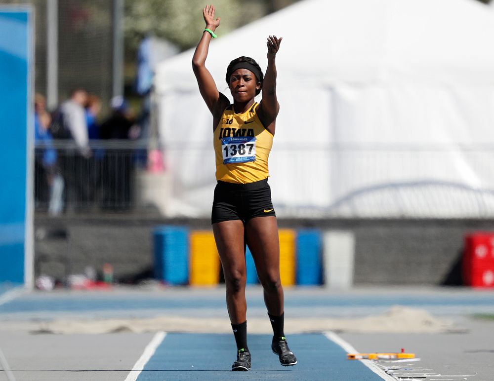 Iowa's Amanda Carty gets the crowd to clap before making a jump in the women's long jump event during the second day of the Drake Relays at Drake Stadium in Des Moines on Friday, Apr. 26, 2019. (Stephen Mally/hawkeyesports.com)