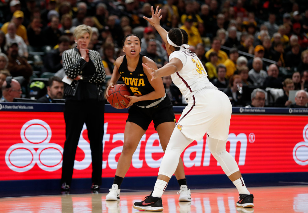 Iowa Hawkeyes guard Alexis Sevillian (5) 