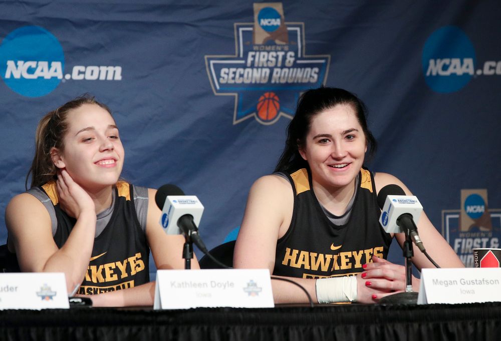 Iowa Hawkeyes guard Kathleen Doyle (22) and forward Megan Gustafson (10) smile during media availability before their next game in the 2019 NCAA Women's Basketball Tournament at Carver Hawkeye Arena in Iowa City on Saturday, Mar. 23, 2019. (Stephen Mally for hawkeyesports.com)