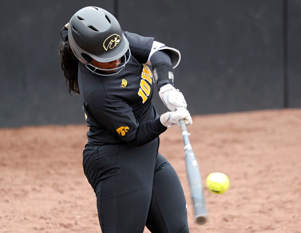 Iowa’s DoniRae Mayhew (24) hits a 3-run home run during the sixth inning of their game against Iowa Softball vs Indian Hills Community College at Pearl Field in Iowa City on Sunday, Oct 6, 2019. (Stephen Mally/hawkeyesports.com)