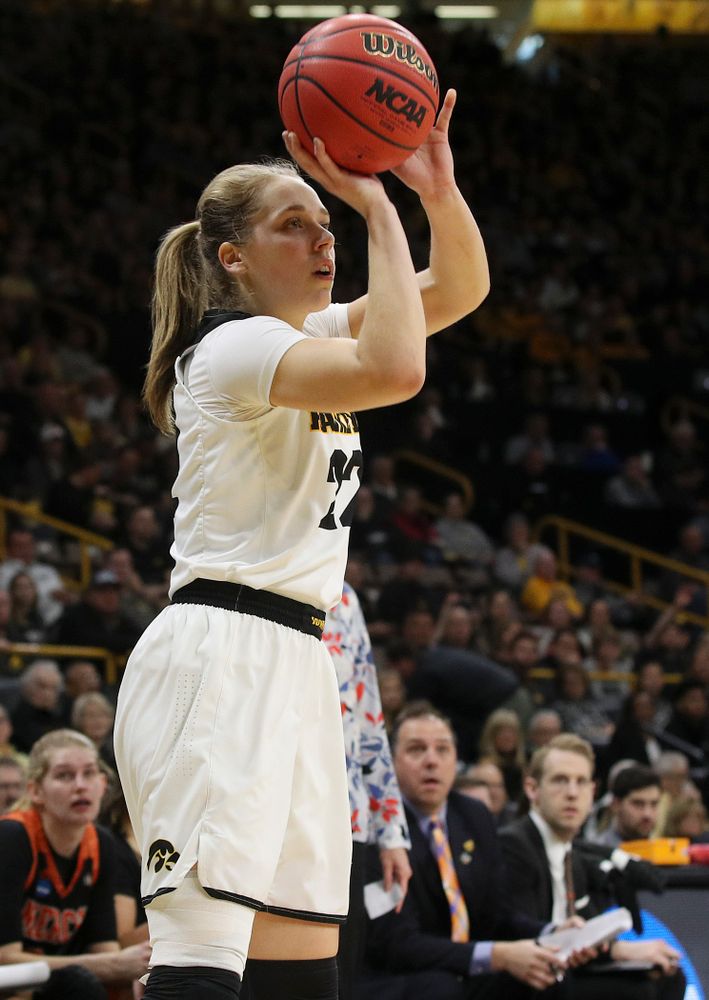 Iowa Hawkeyes guard Kathleen Doyle (22) shoots during the first round of the 2019 NCAA Women's Basketball Tournament at Carver Hawkeye Arena in Iowa City on Friday, Mar. 22, 2019. (Stephen Mally for hawkeyesports.com)