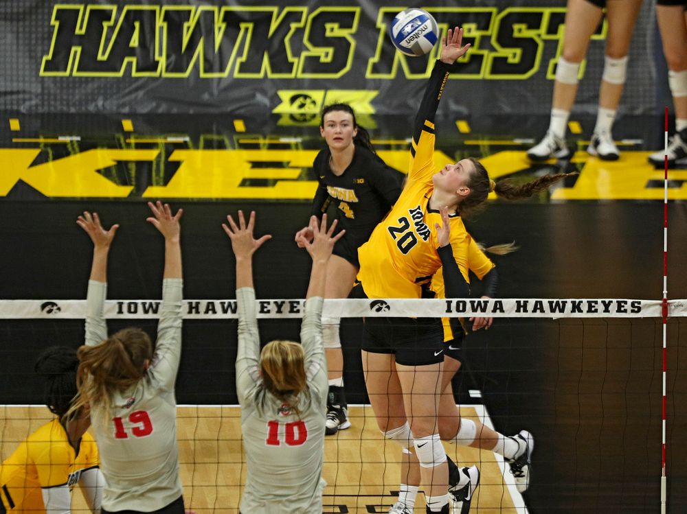 Iowa’s Edina Schmidt (20) lines up a shot during the second set of their match at Carver-Hawkeye Arena in Iowa City on Friday, Nov 29, 2019. (Stephen Mally/hawkeyesports.com)