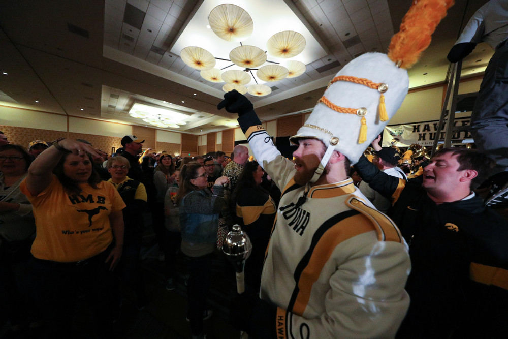 The Hawkeye Marching Band and the Iowa Spirit Squads perform during the Holiday Bowl Hawkeye Huddle Thursday, December 26, 2019 at the Hilton in downtown San Diego. (Brian Ray/hawkeyesports.com)