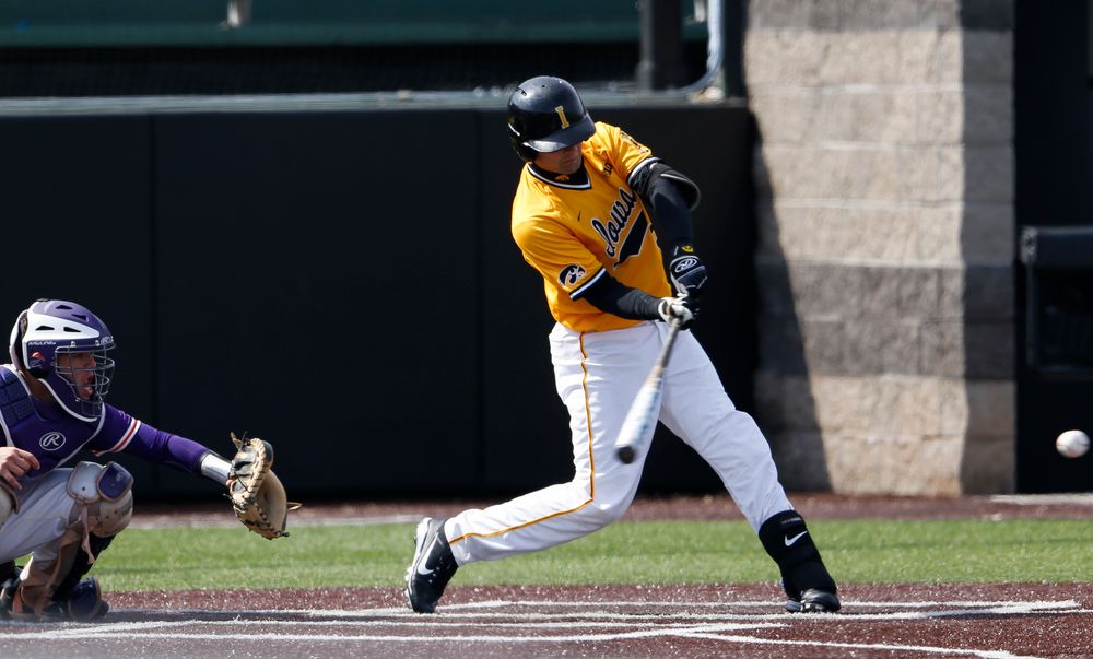 Iowa Hawkeyes infielder Kyle Crowl (23) swings at a pitch during a game against Evansville at Duane Banks Field on March 18, 2018. (Tork Mason/hawkeyesports.com)