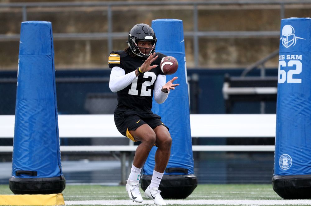 Iowa Hawkeyes wide receiver Brandon Smith (12) makes a catch during practice Monday, December 23, 2019 at Mesa College in San Diego. (Brian Ray/hawkeyesports.com)