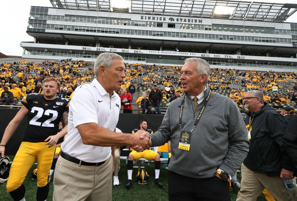 Iowa Hawkeyes head coach Kirk Ferentz and Henry B. and Patricia B. Tippie Director of Athletics Chair Gary Barta against Middle Tennessee State Saturday, September 28, 2019 at Kinnick Stadium. (Brian Ray/hawkeyesports.com)