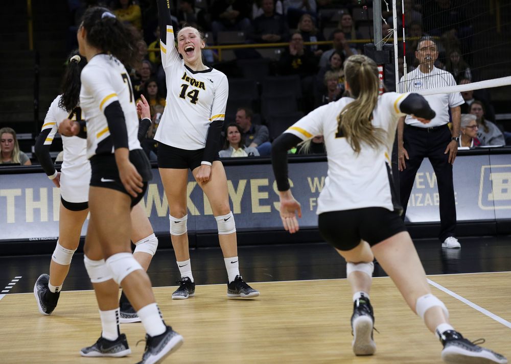 Iowa Hawkeyes outside hitter Cali Hoye (14) celebrates after winning a point during a match against Penn State at Carver-Hawkeye Arena on November 3, 2018. (Tork Mason/hawkeyesports.com)