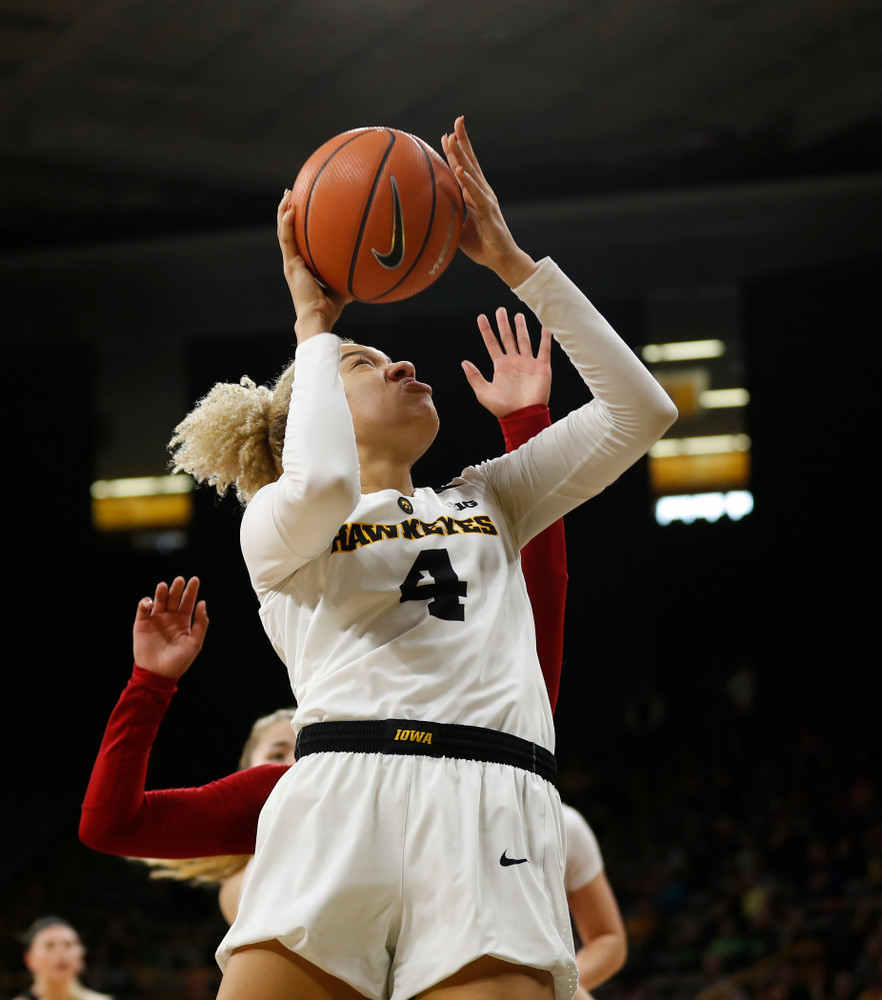 Iowa Hawkeyes forward Chase Coley (4) 