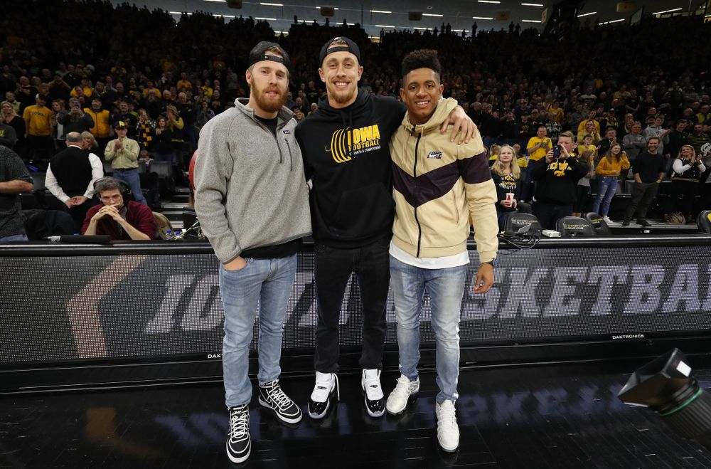 Former Hawkeye Football players and current San Francisco 49ers George Kittle, Greg Mabin, and CJ Beathard, against the Ohio State Buckeyes Saturday, January 12, 2019 at Carver-Hawkeye Arena. (Brian Ray/hawkeyesports.com)