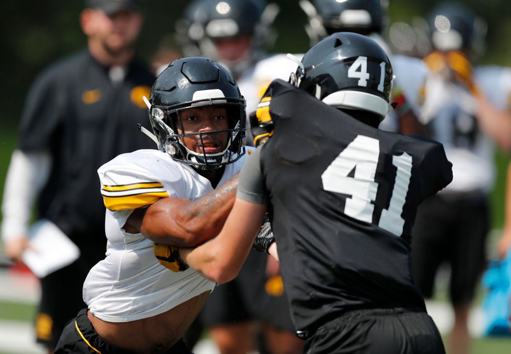 Iowa Hawkeyes defensive back Josh Turner (4) during fall camp practice No. 9 Friday, August 10, 2018 at the Kenyon Practice Facility. (Brian Ray/hawkeyesports.com)