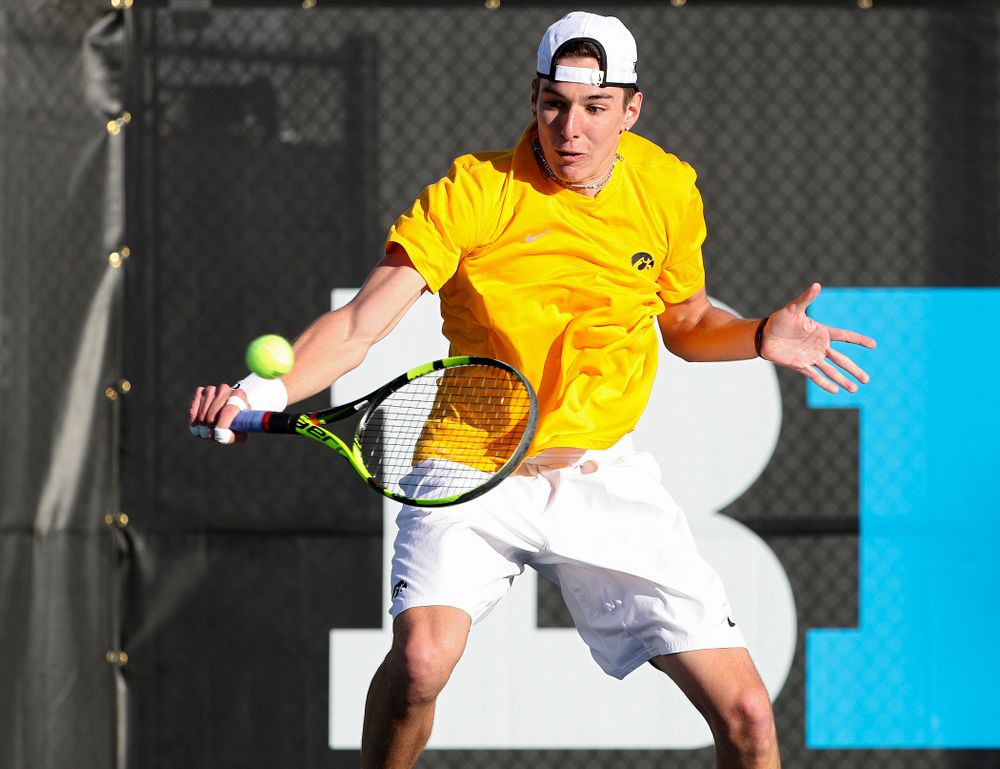 Iowa's Nikita Snezhko during their doubles match again Michigan State at the Hawkeye Tennis and Recreation Complex in Iowa City on Friday, Apr. 19, 2019. (Stephen Mally/hawkeyesports.com)