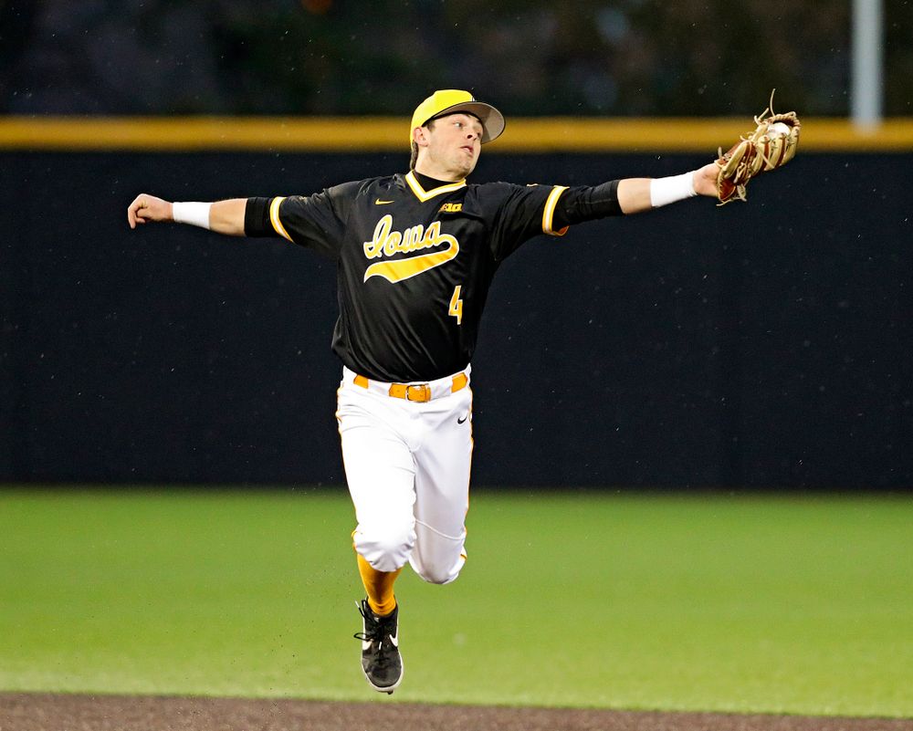 Iowa Hawkeyes shortstop Mitchell Boe (4) snags a throw during the ninth inning of their game against Illinois State at Duane Banks Field in Iowa City on Wednesday, Apr. 3, 2019. (Stephen Mally/hawkeyesports.com)