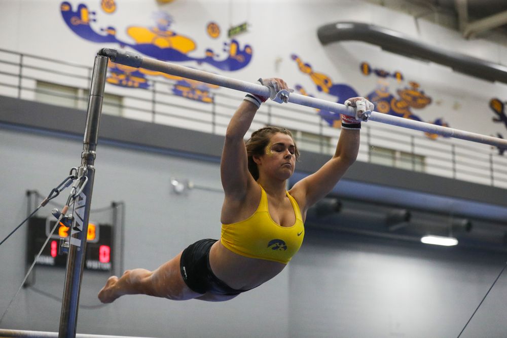 Erin Castle performs on the uneven bars during the Iowa women’s gymnastics Black and Gold Intraquad Meet on Saturday, December 7, 2019 at the UI Field House. (Lily Smith/hawkeyesports.com)