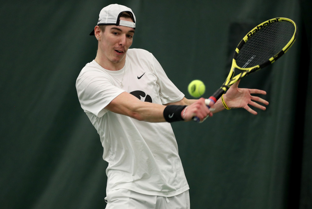 Iowa’s Nikita Snezhko against Cornell Sunday, March 8, 2020 at the Hawkeye Tennis and Recreation Center. (Brian Ray/hawkeyesports.com)