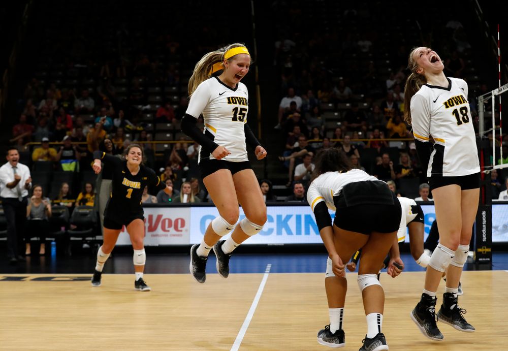 Iowa Hawkeyes defensive specialist Maddie Slagle (15) and middle blocker Hannah Clayton (18) against the Michigan Wolverines Sunday, September 23, 2018 at Carver-Hawkeye Arena. (Brian Ray/hawkeyesports.com)