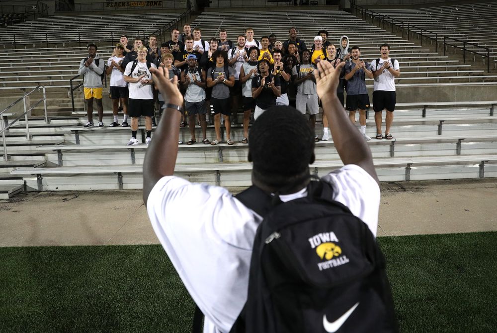 Iowa Hawkeyes defensive tackle Daviyon Nixon (54) leads the new players in the ÒFight SongÓ  Thursday, August 22, 2019 at Kinnick Stadium in Iowa City. (Brian Ray/hawkeyesports.com)