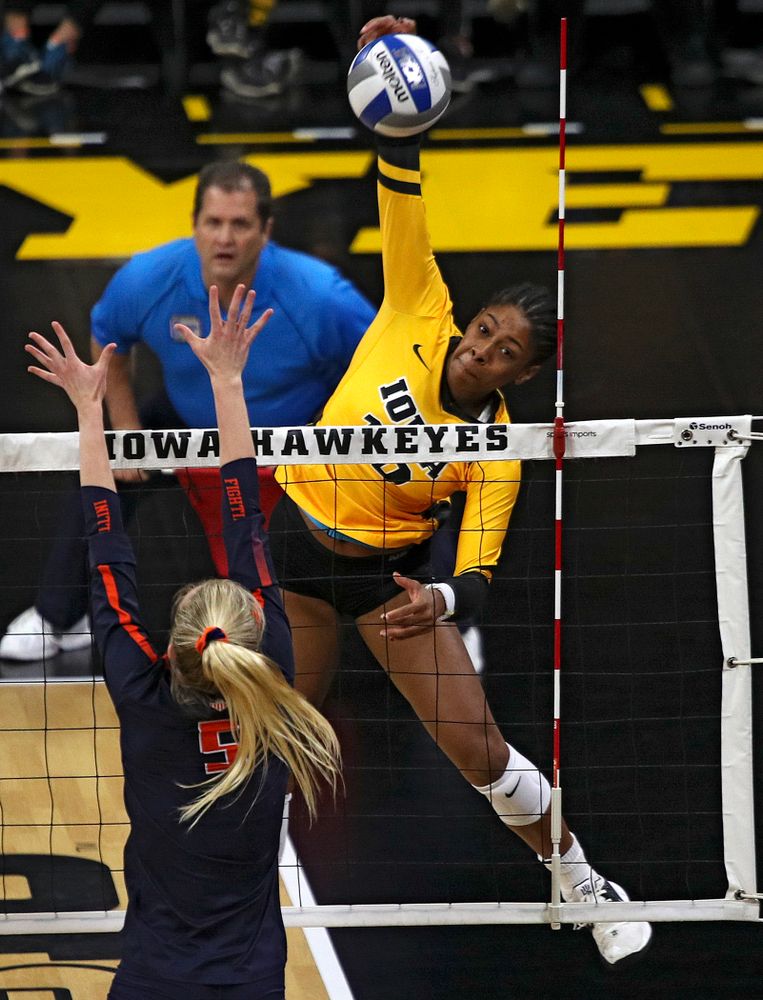 Iowa’s Griere Hughes (10) gets a kill during the first set of their match against Illinois at Carver-Hawkeye Arena in Iowa City on Wednesday, Nov 6, 2019. (Stephen Mally/hawkeyesports.com)
