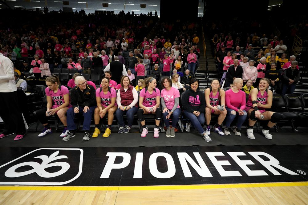The Iowa Hawkeyes wait to be introduced by women affected by breast cancer before their game against the Wisconsin Badgers Sunday, February 16, 2020 at Carver-Hawkeye Arena. (Brian Ray/hawkeyesports.com)