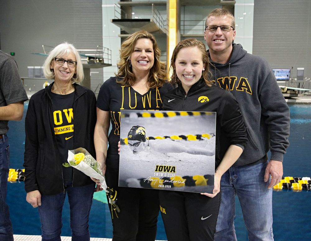 Iowa’s Amy Lenderink is honored on senior day before their meet at the Campus Recreation and Wellness Center in Iowa City on Friday, February 7, 2020. (Stephen Mally/hawkeyesports.com)