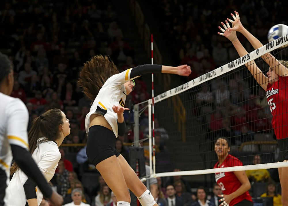 Iowa’s Grace Tubbs (16) gets a kill during the second set of their match against Nebraska at Carver-Hawkeye Arena in Iowa City on Saturday, Nov 9, 2019. (Stephen Mally/hawkeyesports.com)