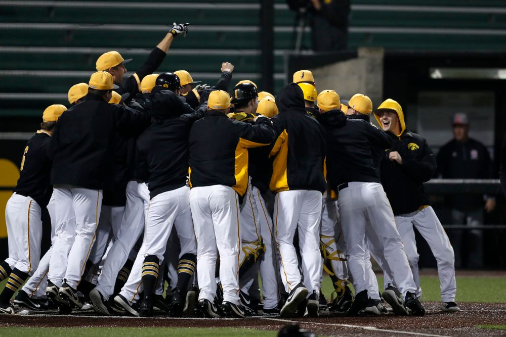Iowa Hawkeyes catcher Tyler Cropley (5) celebrates after hitting a walk off grand slam in the bottom of the ninth against the Bradley Braves Wednesday, March 28, 2018 at Duane Banks Field. (Brian Ray/hawkeyesports.com)