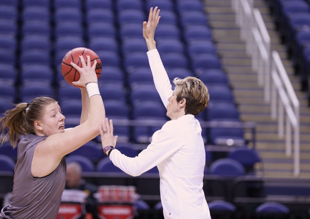 Iowa Hawkeyes center Monika Czinano (25) and associate head coach Jan Jensen during practice and media before the regional final of the 2019 NCAA Women's College Basketball Tournament against the Baylor Bears Sunday, March 31, 2019 at Greensboro Coliseum in Greensboro, NC.(Brian Ray/hawkeyesports.com)