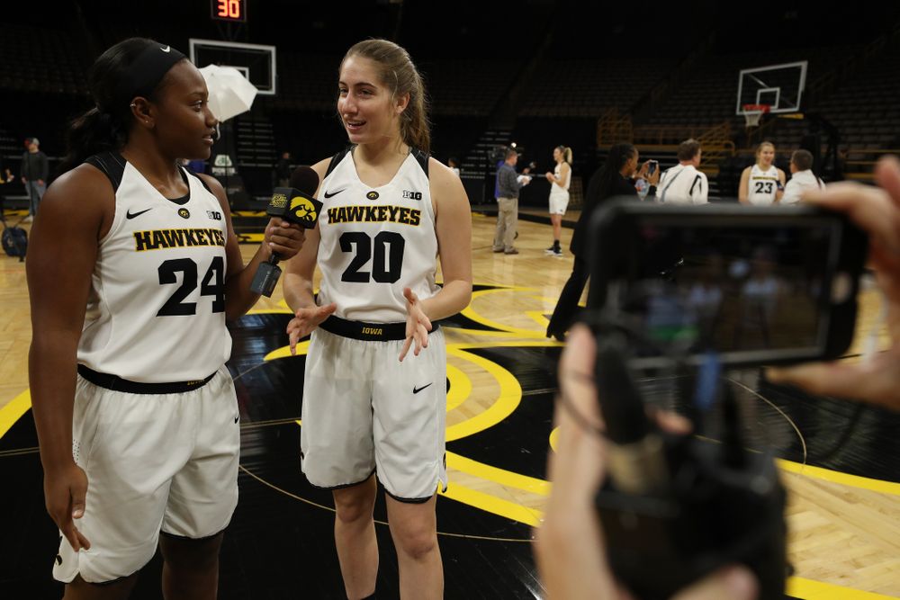Iowa Hawkeyes guard Zion Sanders (24) and guard Kate Martin (20) during the team's annual media day Wednesday, October 31, 2018 at Carver-Hawkeye Arena. (Brian Ray/hawkeyesports.com)