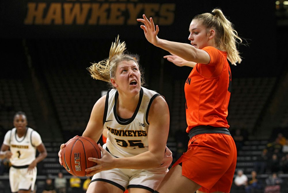 Iowa forward/center Monika Czinano (25) eyes the basket during the first quarter of their overtime win against Princeton at Carver-Hawkeye Arena in Iowa City on Wednesday, Nov 20, 2019. (Stephen Mally/hawkeyesports.com)