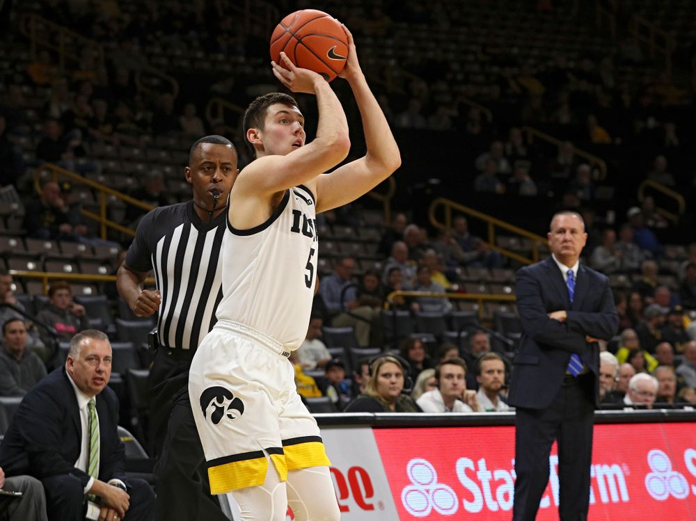 Iowa Hawkeyes guard CJ Fredrick (5) makes a 3-pointer during the first half of their exhibition game against Lindsey Wilson College at Carver-Hawkeye Arena in Iowa City on Monday, Nov 4, 2019. (Stephen Mally/hawkeyesports.com)
