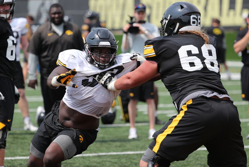 Iowa Hawkeyes defensive end Brandon Simon (93) against offensive lineman Landan Paulsen (68) during the third practice of fall camp Sunday, August 5, 2018 at the Kenyon Football Practice Facility. (Brian Ray/hawkeyesports.com)