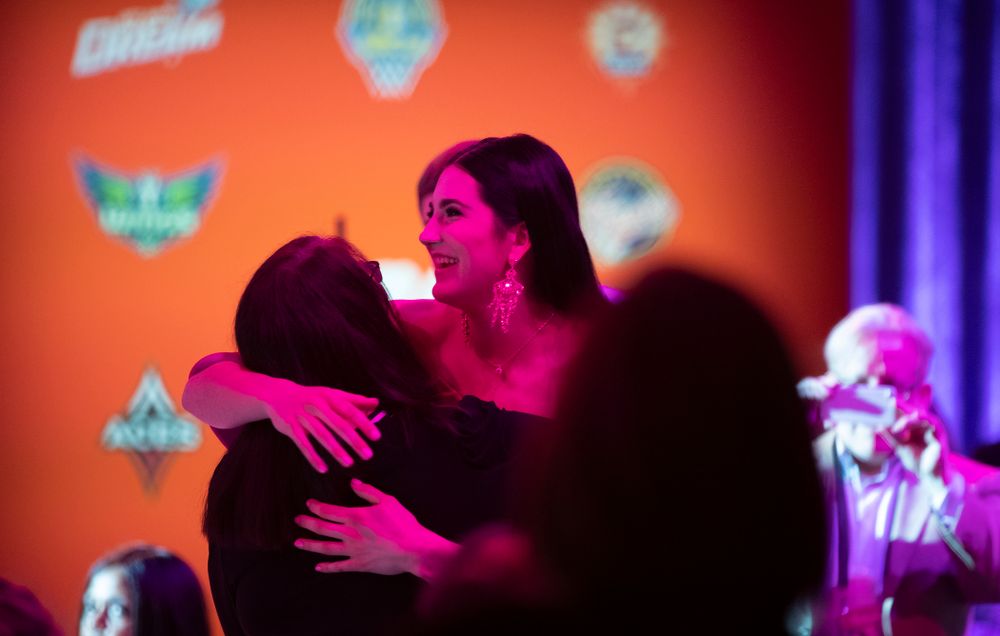 Iowa Hawkeyes forward Megan Gustafson (10) hugs her mother after being selected by the Dallas Wings in the second round of the 2019 WNBA Draft Wednesday, April 10, 2019 at Nike New York Headquarters in New York City. (Brian Ray/hawkeyesports.com)