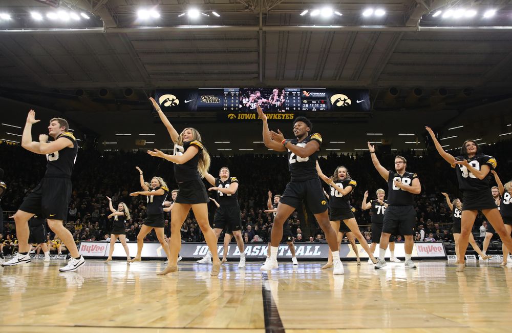 The Iowa Dance Team performs with the Iowa Football Team at halftime of the Iowa Hawkeyes game against the Indiana Hoosiers Friday, February 22, 2019 at Carver-Hawkeye Arena. (Brian Ray/hawkeyesports.com)