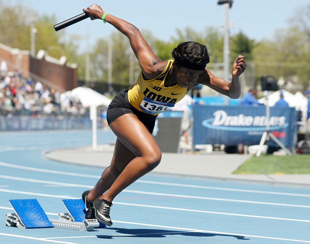 Iowa's Amanda Carty takes off out of the blocks in the women's 400 meter relay event during the second day of the Drake Relays at Drake Stadium in Des Moines on Friday, Apr. 26, 2019. (Stephen Mally/hawkeyesports.com)