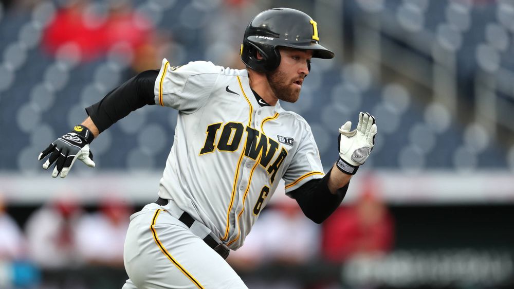Iowa Hawkeyes outfielder Justin Jenkins (6) singles against the Indiana Hoosiers in the first round of the Big Ten Baseball Tournament Wednesday, May 22, 2019 at TD Ameritrade Park in Omaha, Neb. (Brian Ray/hawkeyesports.com)
