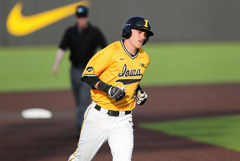 Iowa Hawkeyes shortstop Tanner Wetrich (16) rounds the bases after hitting a home run during the fifth inning of their game against Northern Illinois at Duane Banks Field in Iowa City on Tuesday, Apr. 16, 2019. (Stephen Mally/hawkeyesports.com)