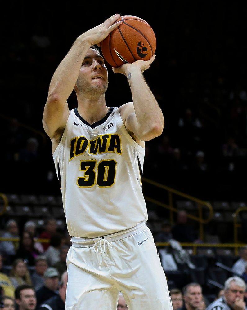 Iowa Hawkeyes guard Connor McCaffery (30) puts up a 3-pointer during a game against Guilford College at Carver-Hawkeye Arena on November 4, 2018. (Tork Mason/hawkeyesports.com)