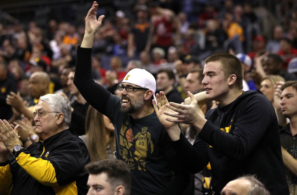 Fans cheer on the Iowa Hawkeyes against the Cincinnati Bearcats in the first round of the 2019 NCAA Men's Basketball Tournament Friday, March 22, 2019 at Nationwide Arena in Columbus, Ohio. (Brian Ray/hawkeyesports.com)