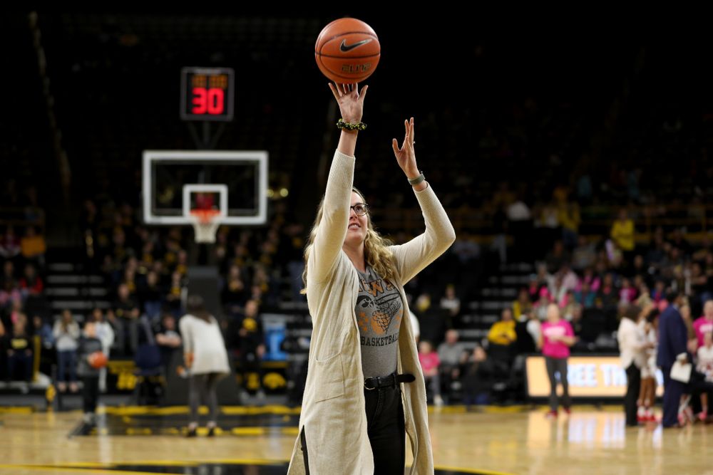 Former player Nicole Smith shoots free throws during the Iowa Hawkeyes game against the Wisconsin Badgers Sunday, February 16, 2020 at Carver-Hawkeye Arena. (Brian Ray/hawkeyesports.com)