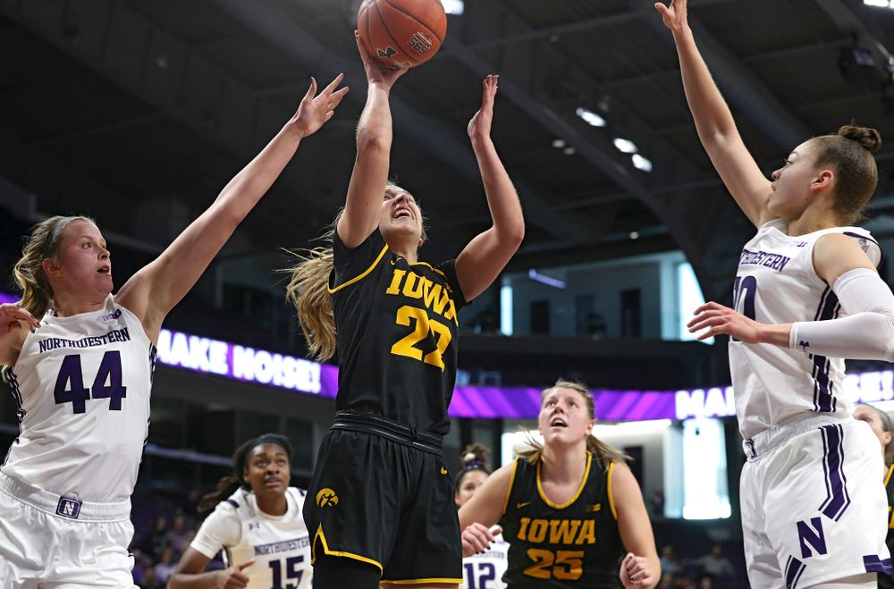 Iowa Hawkeyes guard Kathleen Doyle (22) scores a basket during the third quarter of their game at Welsh-Ryan Arena in Evanston, Ill. on Sunday, January 5, 2020. (Stephen Mally/hawkeyesports.com)