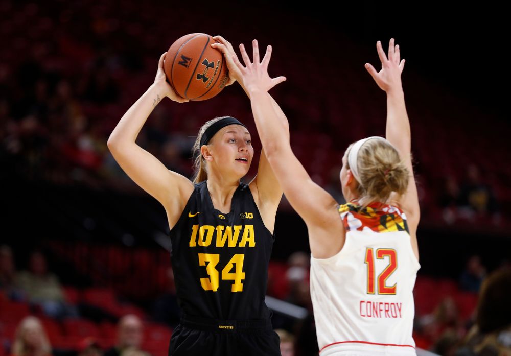 Iowa Hawkeyes forward Carly Mohns (34) 