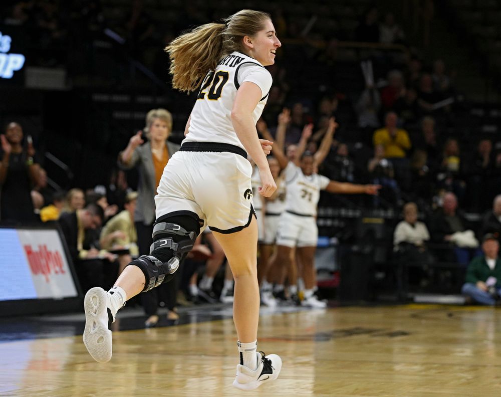 Iowa Hawkeyes guard Kate Martin (20) runs down the court after making a 3-pointer during the second quarter of the game at Carver-Hawkeye Arena in Iowa City on Thursday, February 6, 2020. (Stephen Mally/hawkeyesports.com)