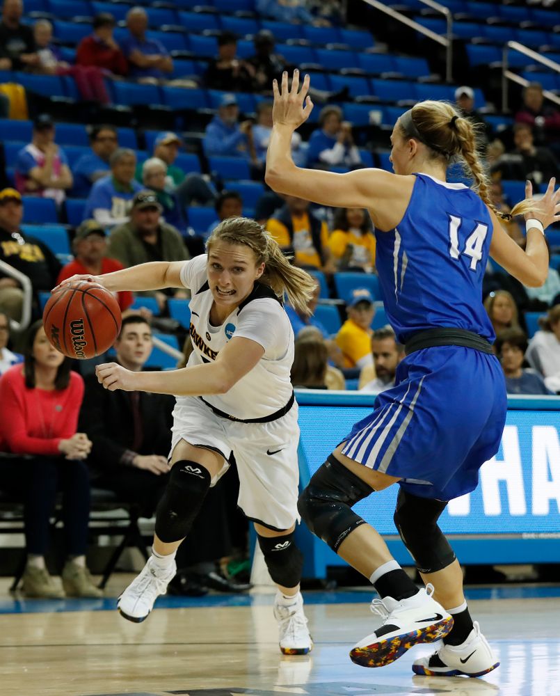 Iowa Hawkeyes guard Makenzie Meyer (3) drives to the hoop against the Creighton Bluejays in the first round of the 2018 NCAA Women's Basketball Tournament Saturday, March 17, 2018 at Pauley Pavilion on the campus of UCLA. (Brian Ray/hawkeyesports.com)