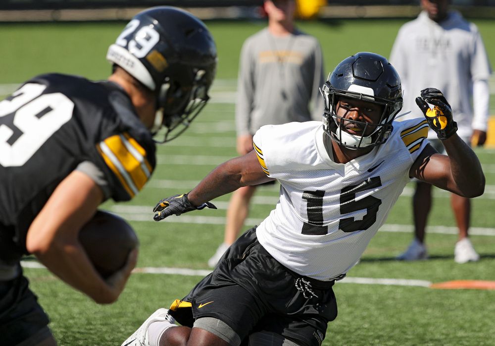 Iowa Hawkeyes defensive back Dallas Craddieth (15) eyes wide receiver Jackson Ritter (29) as they run a drill during Fall Camp Practice No. 13 at the Hansen Football Performance Center in Iowa City on Friday, Aug 16, 2019. (Stephen Mally/hawkeyesports.com)