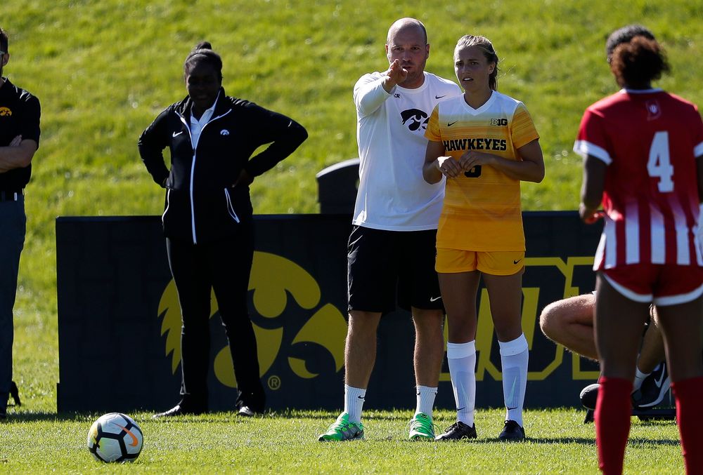 Iowa Hawkeyes assistant coach Rade Tanaskovic gives instructions to Iowa Hawkeyes midfielder Isabella Blackman (6) before a free kick during a game against Indiana at the Iowa Soccer Complex on September 23, 2018. (Tork Mason/hawkeyesports.com)