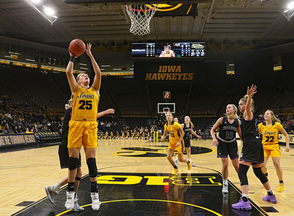 Iowa forward/center Monika Czinano (25) makes a basket during the third quarter of their game against Winona State at Carver-Hawkeye Arena in Iowa City on Sunday, Nov 3, 2019. (Stephen Mally/hawkeyesports.com)
