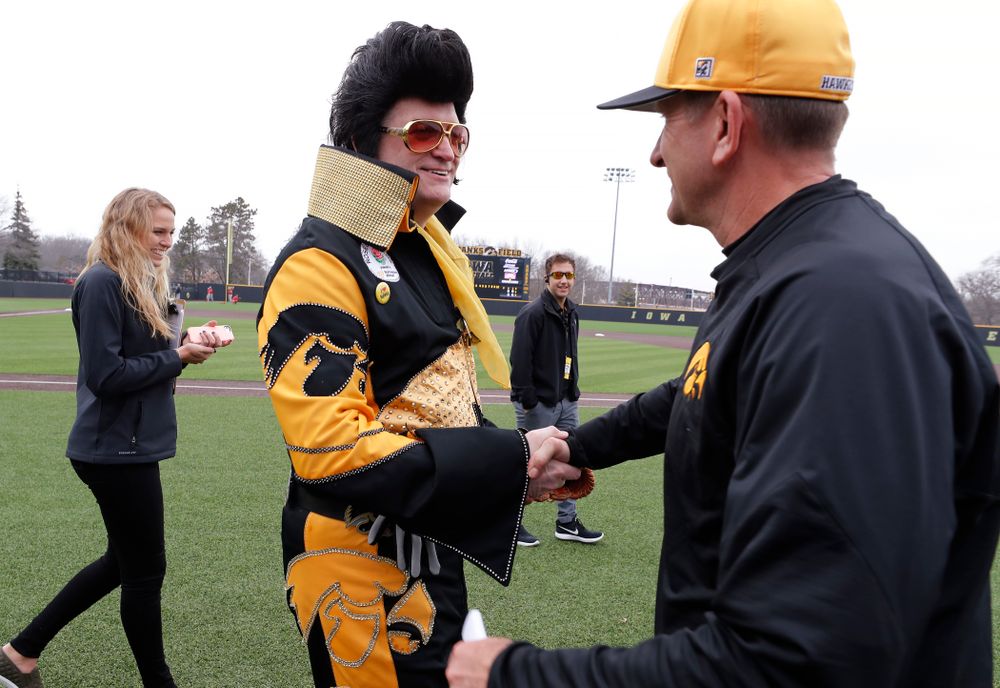 Hawkeye Elvis  and head coach Rick Heller against the Bradley Braves Wednesday, March 28, 2018 at Duane Banks Field. (Brian Ray/hawkeyesports.com)
